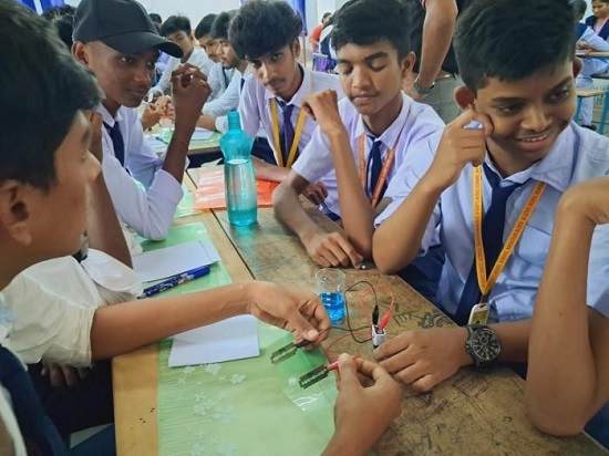 Students performing experiments