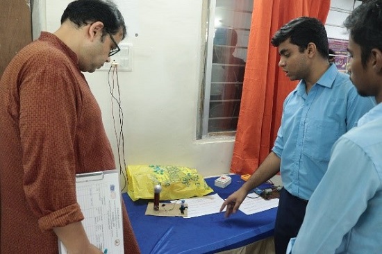 Jury evaluating the science exhibits