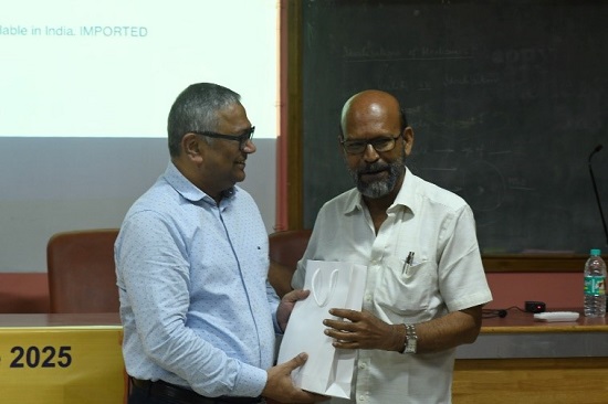 Prof. Pravash Chakraborti felicitating the speaker